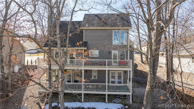5317 Locust Ct, Osage Beach, MO 65065 - rear view of property featuring a balcony, a porch, roof with shingles, and french doors