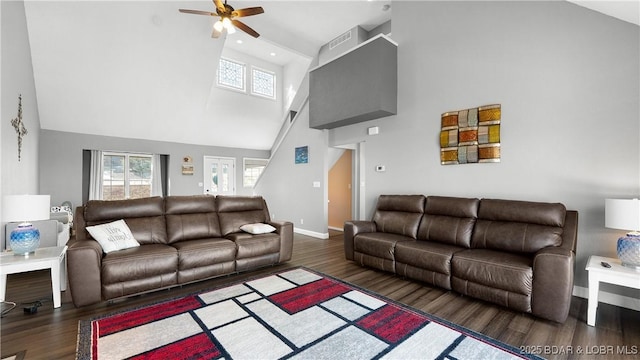 5317 Locust Ct, Osage Beach, MO 65065 - living room featuring a high ceiling, a ceiling fan, wood finished floors, and baseboards