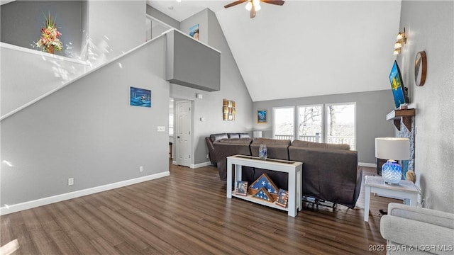 5317 Locust Ct, Osage Beach, MO 65065 - living room with high vaulted ceiling, ceiling fan, wood finished floors, and baseboards