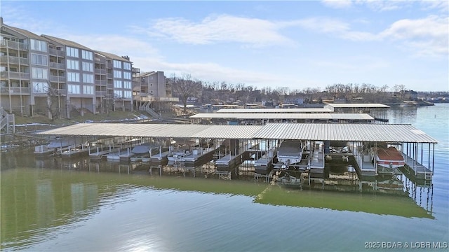 view of dock featuring a water view and boat lift