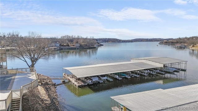 view of dock with a water view and boat lift