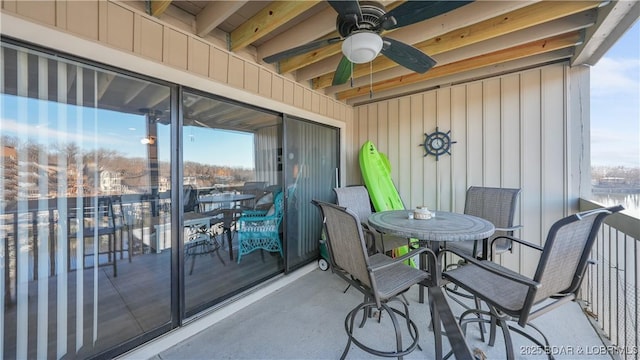 balcony with ceiling fan and outdoor dining space