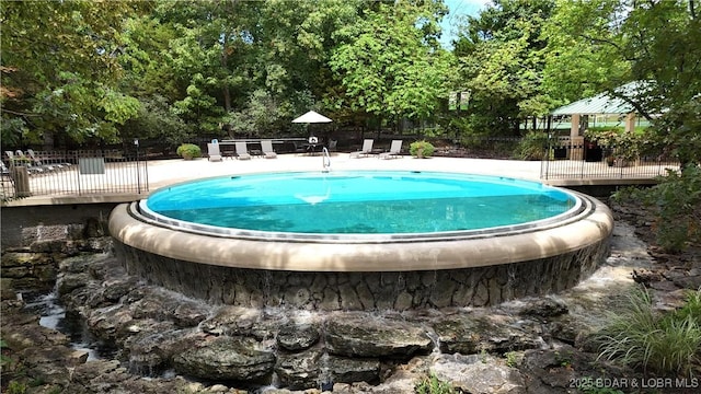 community pool with fence