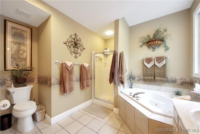 bathroom featuring a jetted tub, a shower stall, toilet, and tile patterned floors