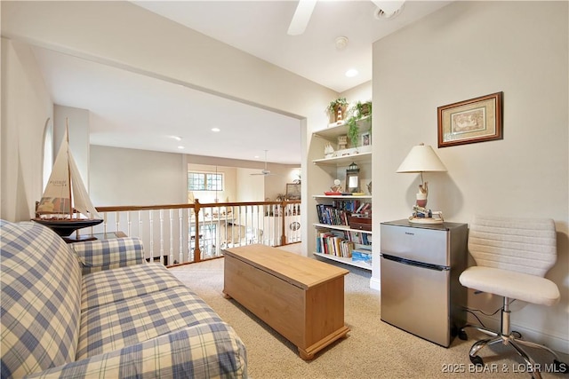 sitting room featuring recessed lighting, a ceiling fan, and light colored carpet