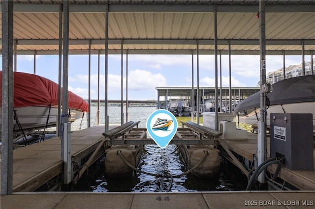 dock area featuring a water view and boat lift