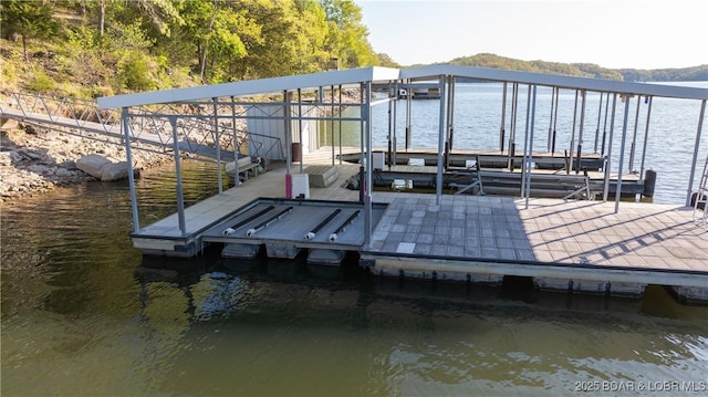 view of dock with a water view