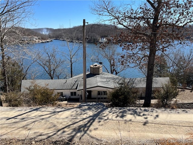 26830 Indian Hills Ln, Barnett, MO 65011 - view of front of home featuring a chimney and a water view