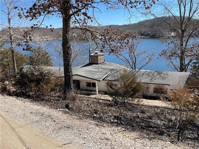 26830 Indian Hills Ln, Barnett, MO 65011 - view of front of home featuring a chimney and a water view
