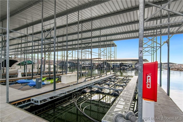 dock area featuring a water view