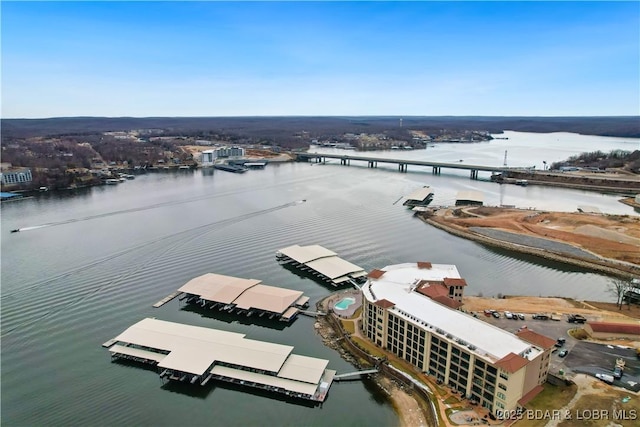 birds eye view of property featuring a water view