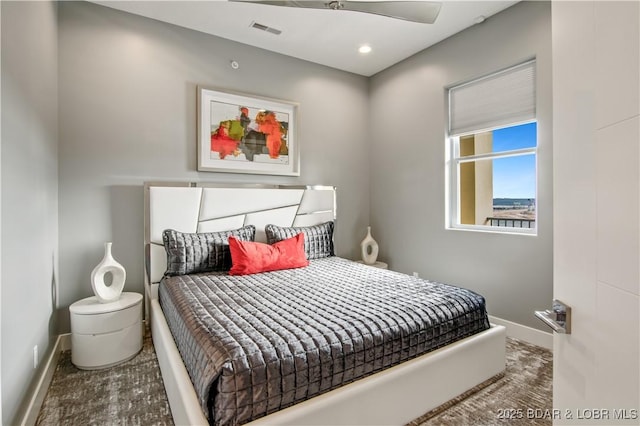 carpeted bedroom featuring recessed lighting, visible vents, and baseboards