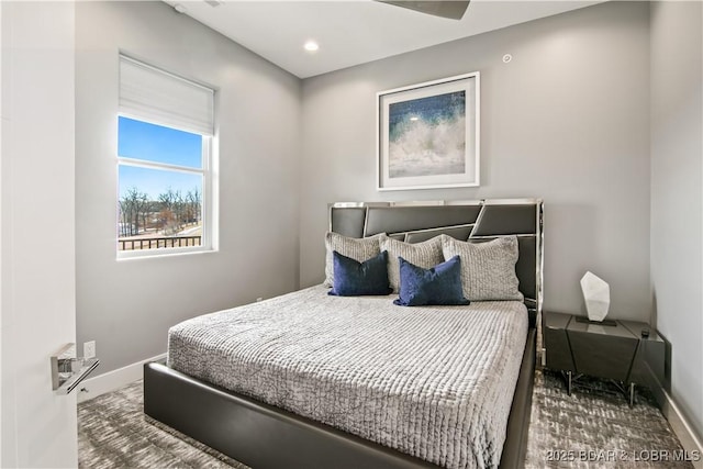 bedroom featuring recessed lighting and baseboards