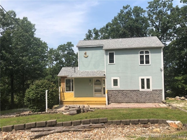 view of front of property featuring covered porch