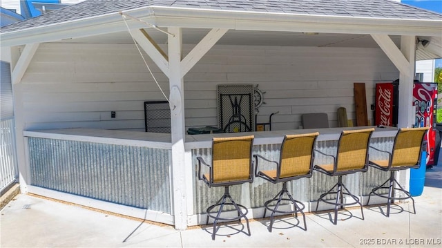 view of patio / terrace featuring outdoor wet bar