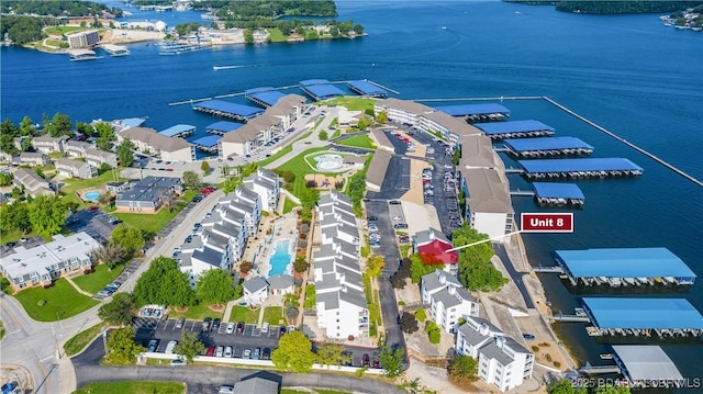 bird's eye view featuring a residential view and a water view