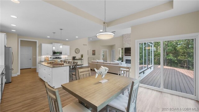 399 W End Cir, Osage Beach, MO 65065 - dining space featuring light wood-style flooring and recessed lighting