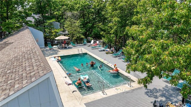 399 W End Cir, Osage Beach, MO 65065 - community pool with a patio and a wooden deck