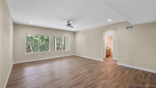 399 W End Cir, Osage Beach, MO 65065 - empty room featuring ceiling fan, wood finished floors, and recessed lighting