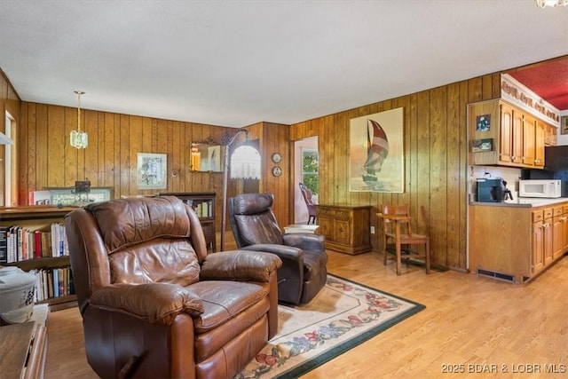 living area with light wood-style floors