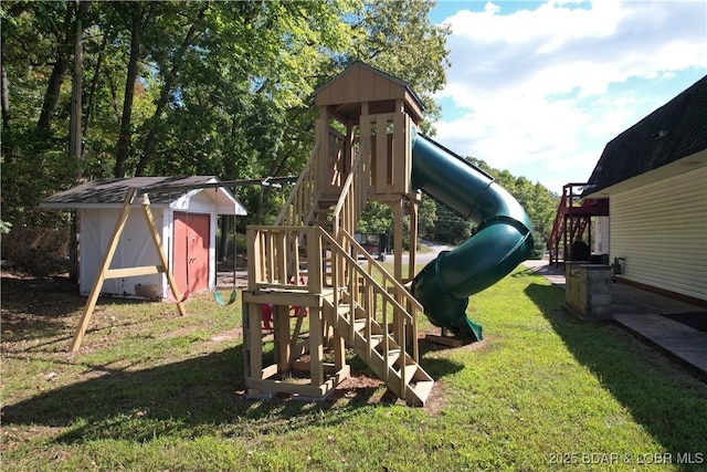 view of playground with a storage unit, a lawn, and an outdoor structure