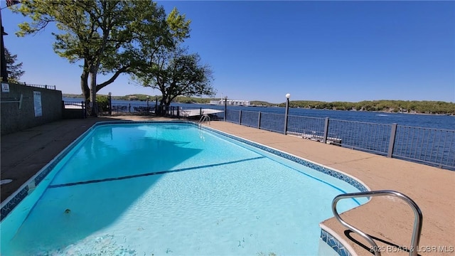 view of pool featuring a fenced in pool and fence