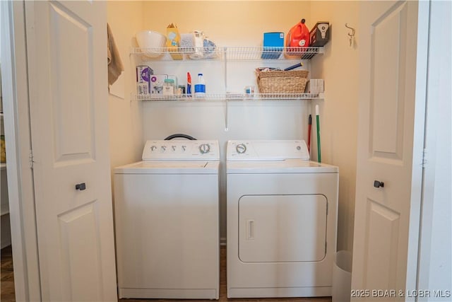 laundry area with laundry area and washer and dryer