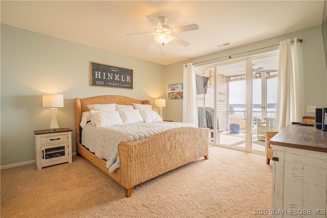 bedroom with baseboards, visible vents, a ceiling fan, light colored carpet, and access to outside