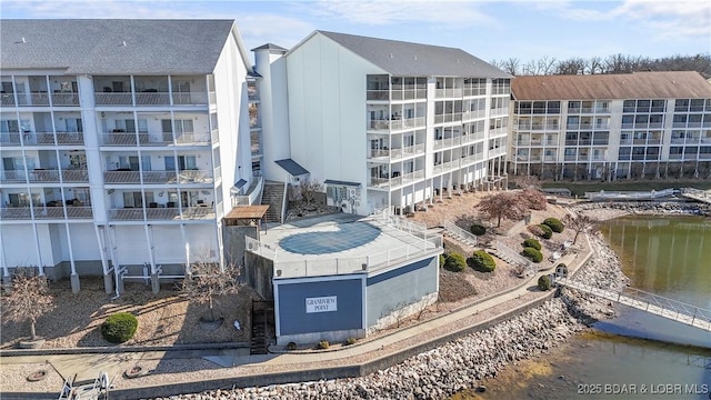 view of building exterior featuring a water view