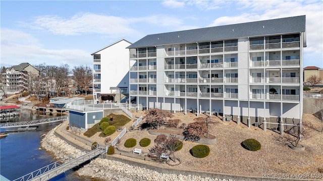 view of building exterior featuring a water view