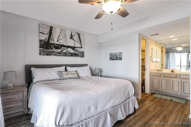 bedroom featuring recessed lighting, dark wood-style flooring, visible vents, a ceiling fan, and ensuite bath