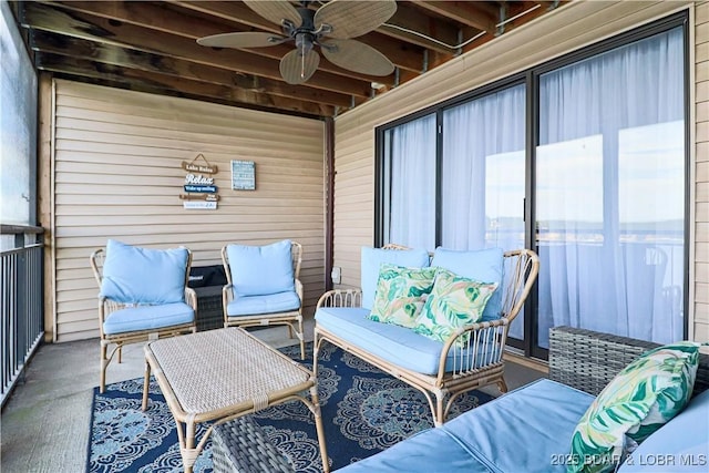 exterior space featuring ceiling fan and an outdoor living space