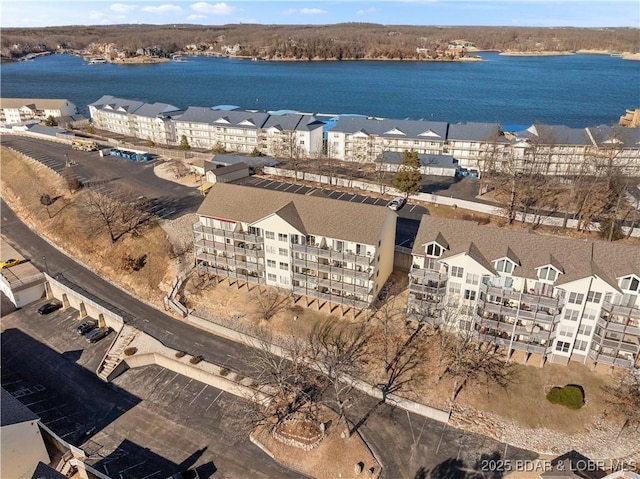 birds eye view of property featuring a water view