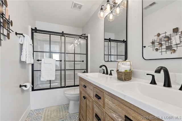 full bath with double vanity, visible vents, and a sink