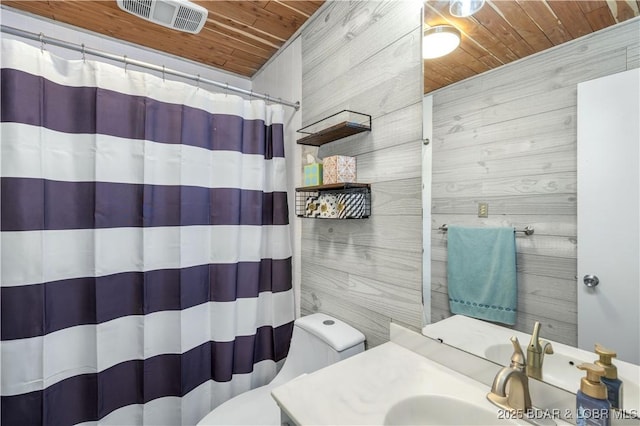 bathroom with visible vents, toilet, a shower with curtain, wood ceiling, and vanity