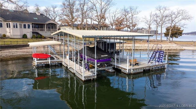 view of dock with a water view and boat lift