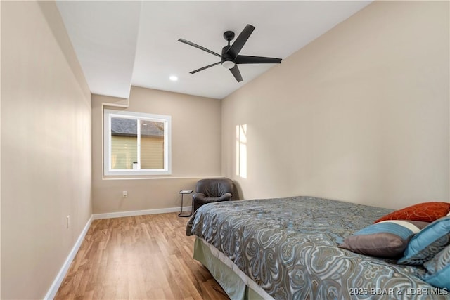 bedroom featuring a ceiling fan, recessed lighting, baseboards, and wood finished floors