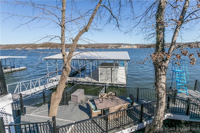 view of dock with a water view