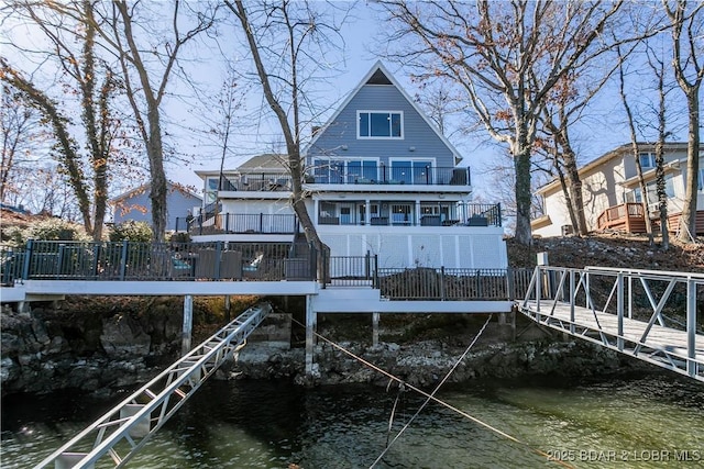 exterior space with a water view