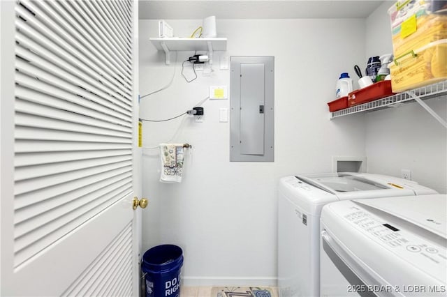 clothes washing area with laundry area, electric panel, and washing machine and clothes dryer