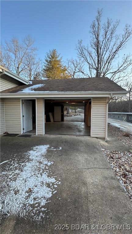 garage with driveway