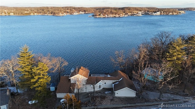 birds eye view of property featuring a water view