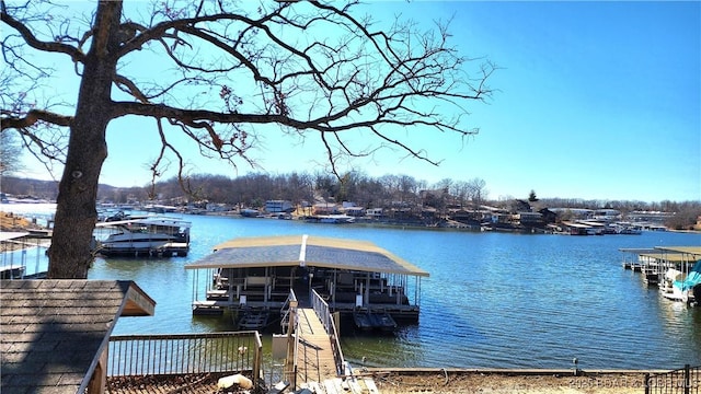 dock area featuring a water view