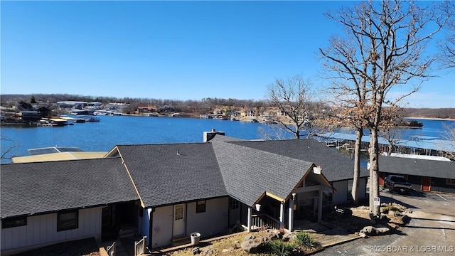 exterior space with a water view