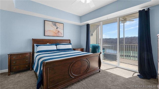 carpeted bedroom featuring a ceiling fan, access to outside, and baseboards