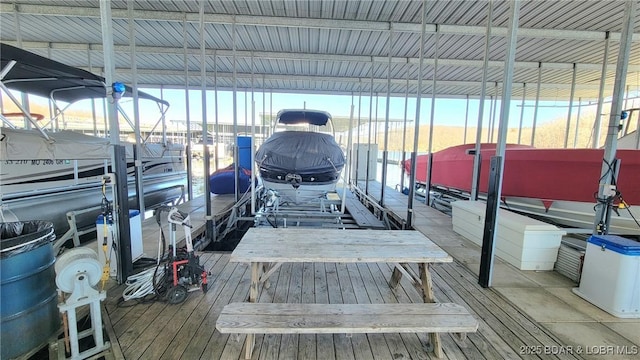 view of dock with boat lift