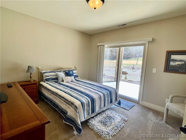 bedroom with access to outside, carpet flooring, visible vents, and baseboards