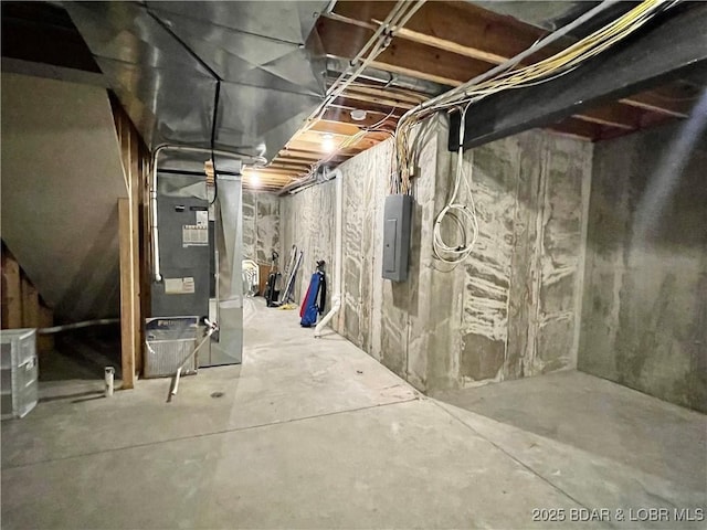 unfinished basement with electric panel