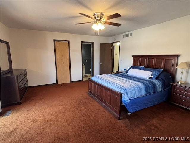 bedroom with carpet, visible vents, and ceiling fan