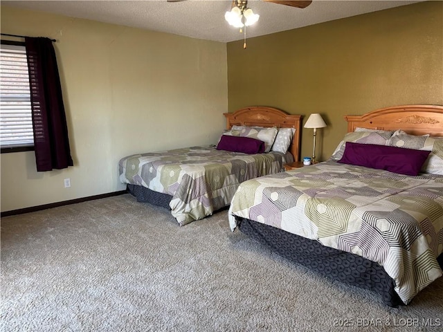 bedroom with carpet floors and baseboards